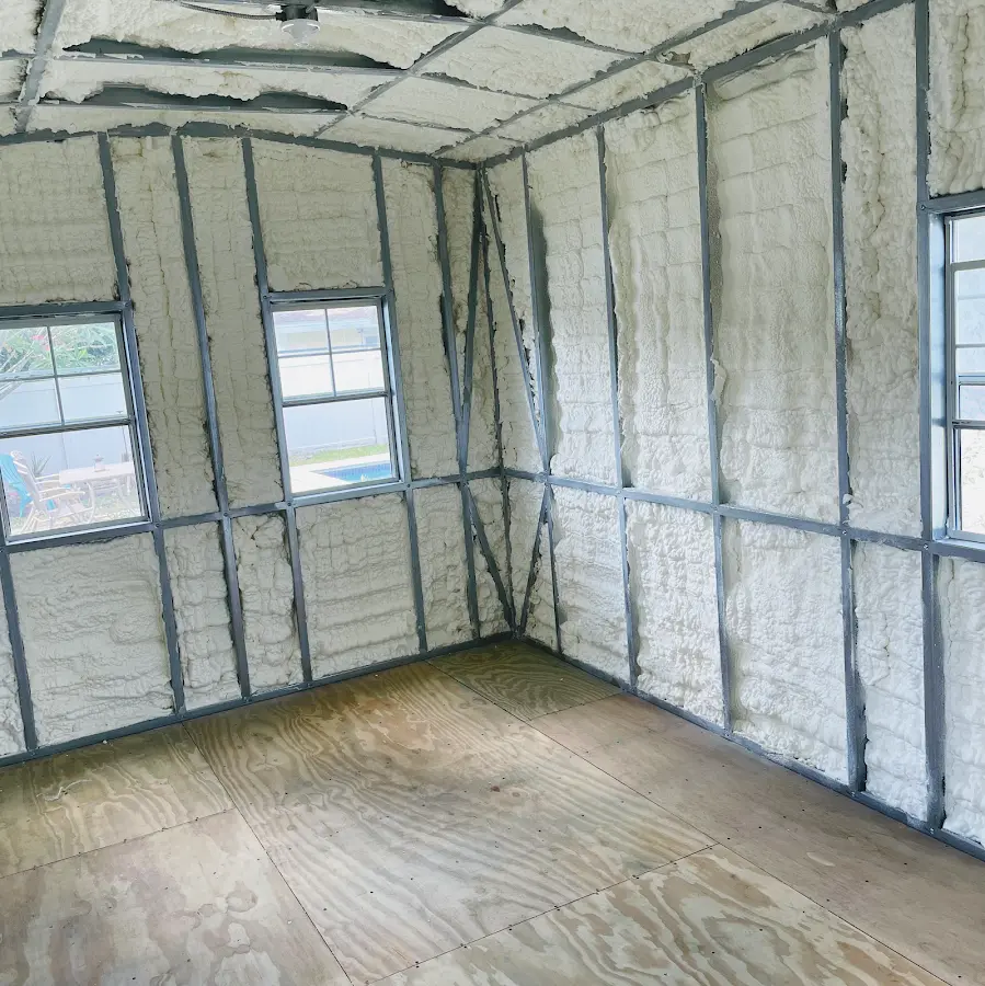 Closed-cell spray foam insulation applied to wall cavities in a residential project in Murray